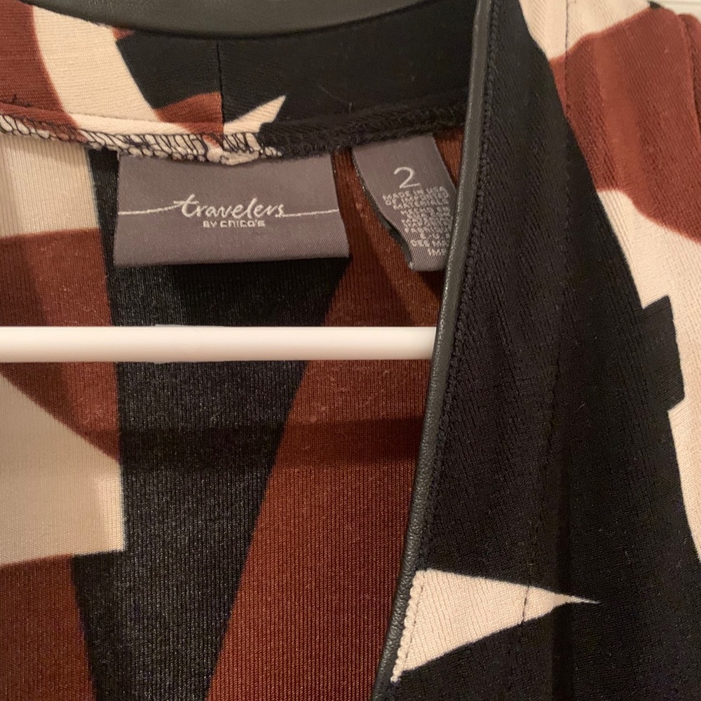 Brown and White Large Chico’s Travelers top.